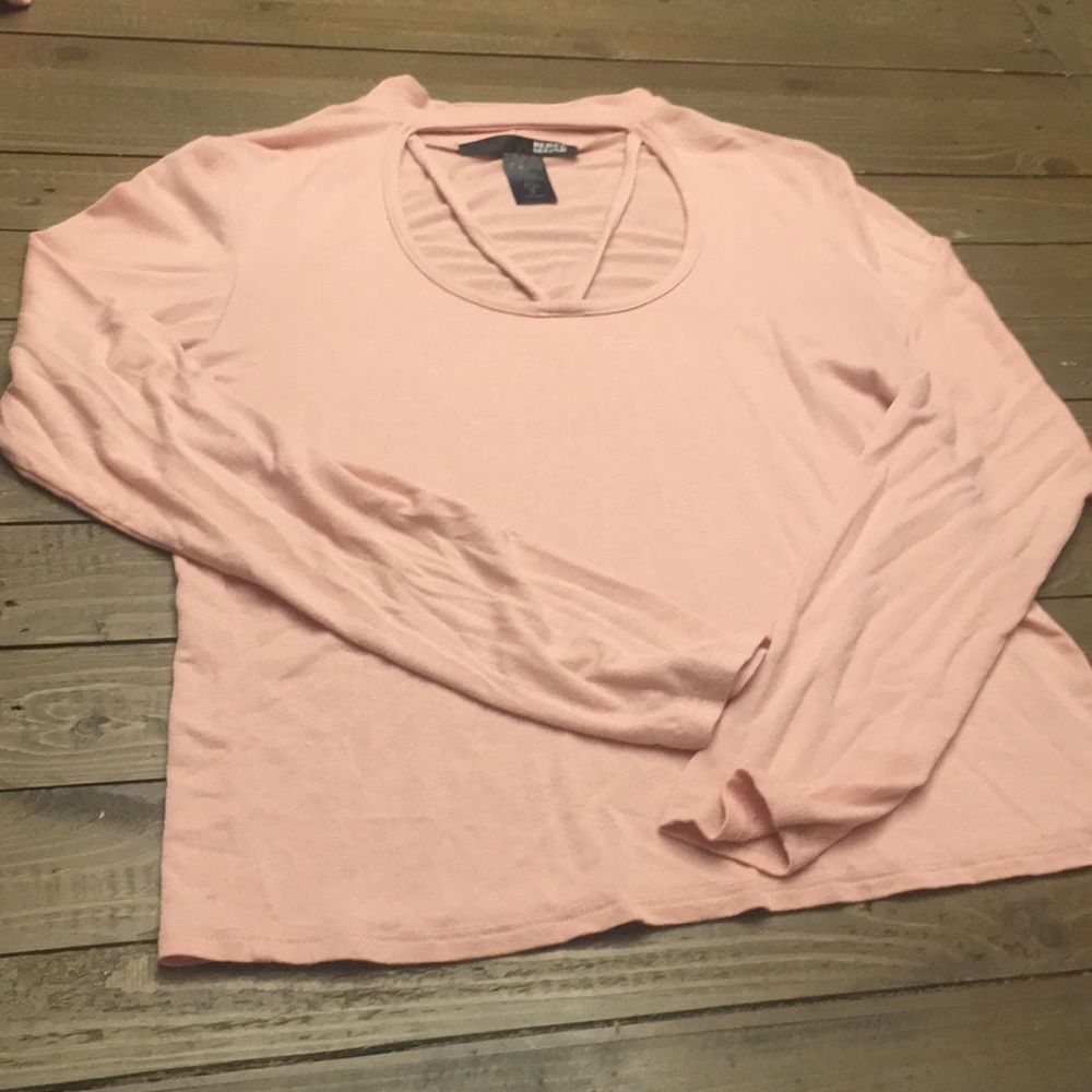Pink top with open chest detail